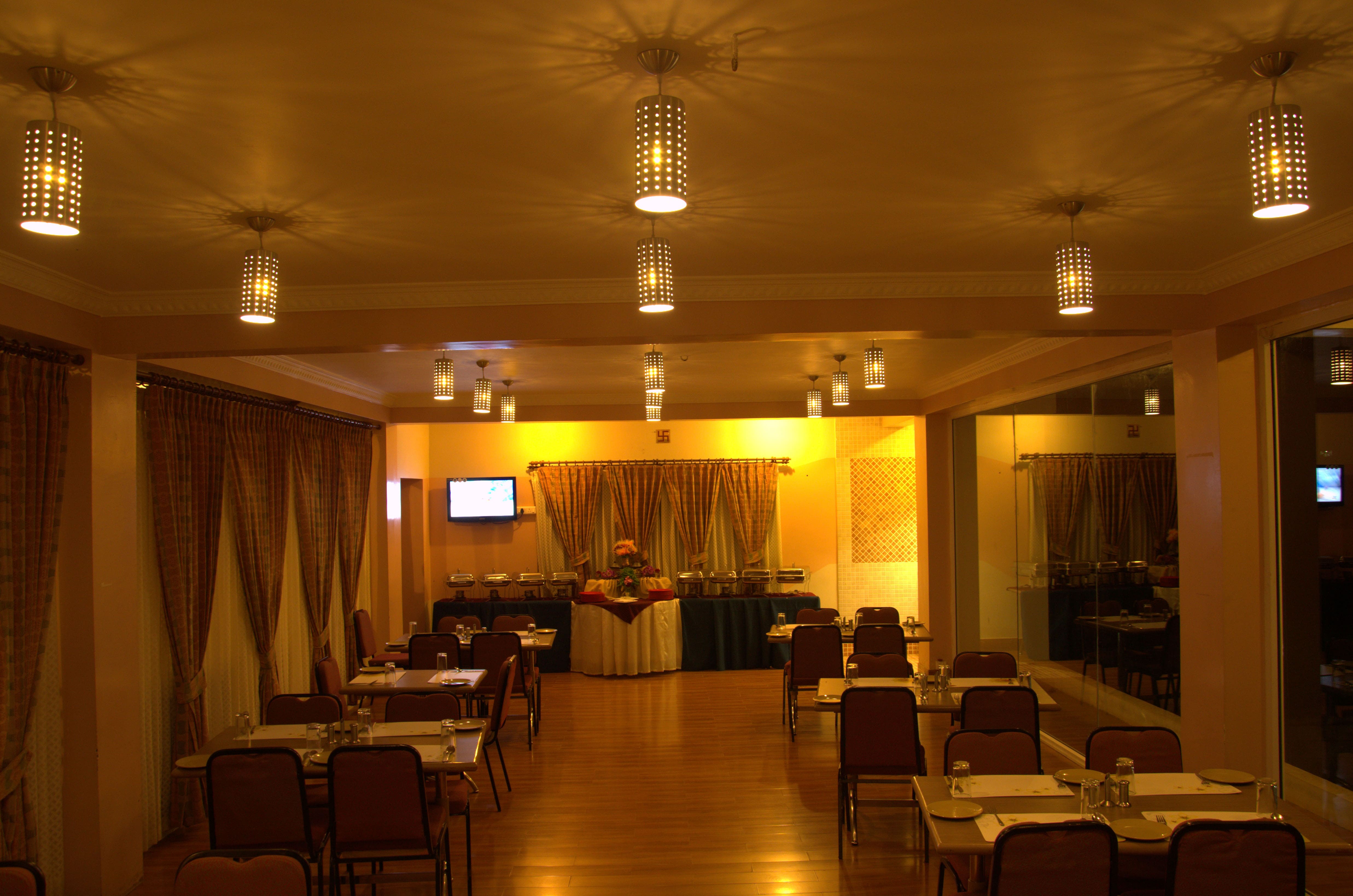 Family-friendly restaurant in Ooty offering delicious South Indian, North Indian, Chinese, Vegetarian, and Non Veg food with a Multi Cuisine Restaurant, Breakfast Buffet, Dinner Buffet, Fine Dining, and Hotel Restaurant experience for families, couples, and groups.